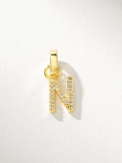 ["Letter Charm ", " Pavé Gold N ", " Product Image ", " Uncommon James"]