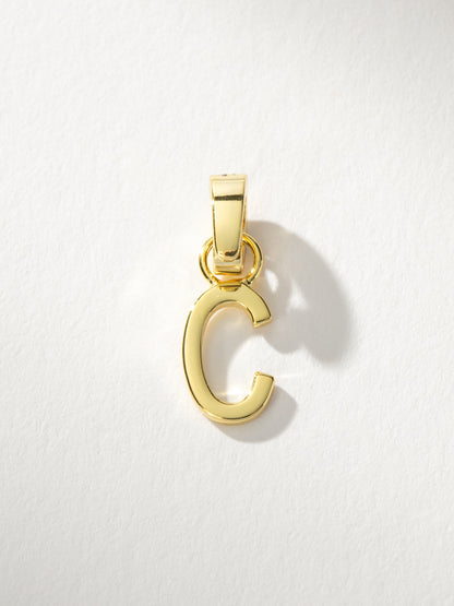 ["Letter Charm ", " Gold Solid C ", " Product Image ", " Uncommon James"]