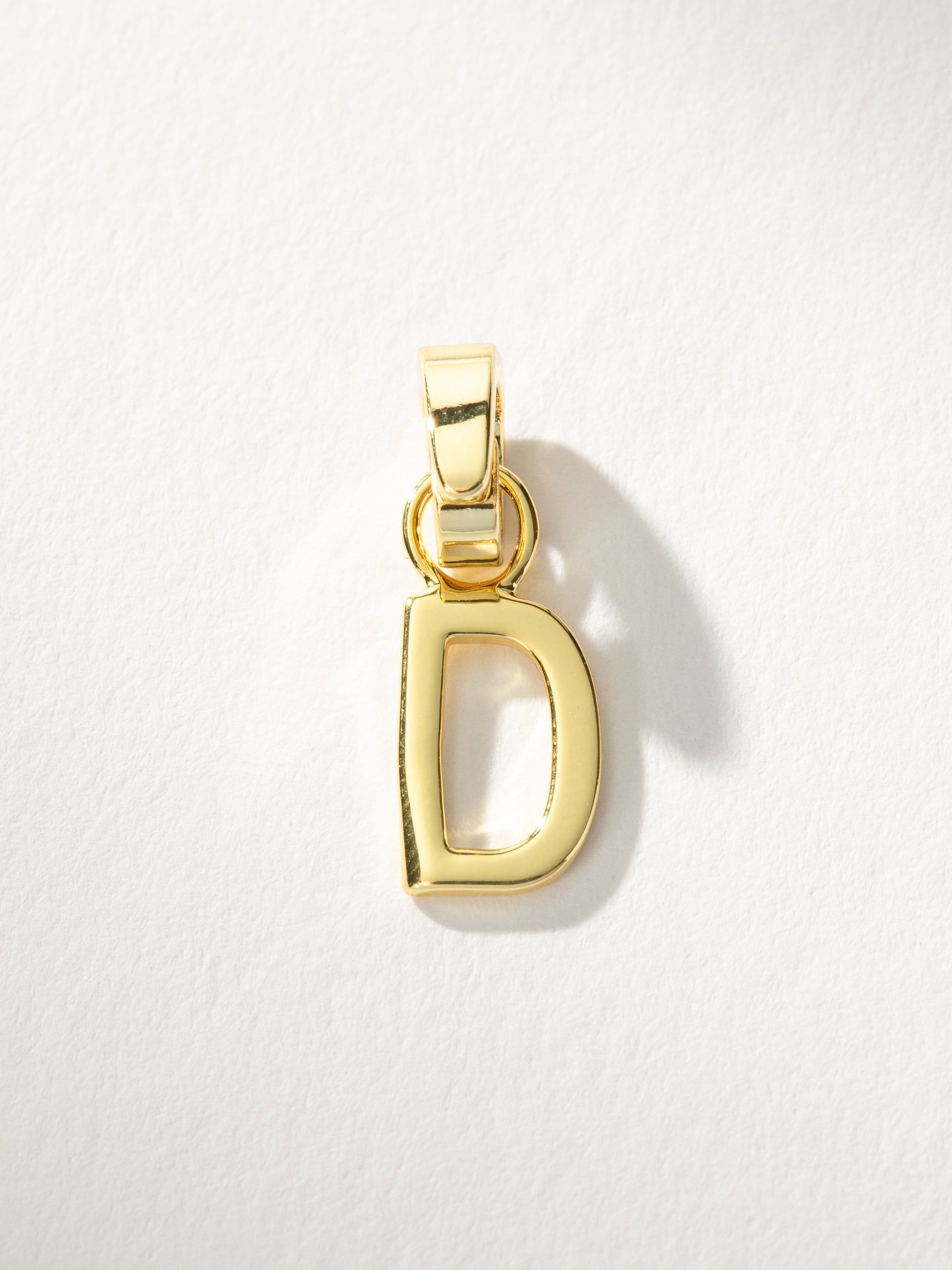 Letter Charm | Gold Solid D | Product Image | Uncommon James