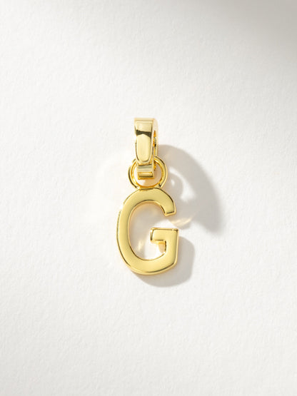 ["Letter Charm ", " Gold Solid G ", " Product Image ", " Uncommon James"]