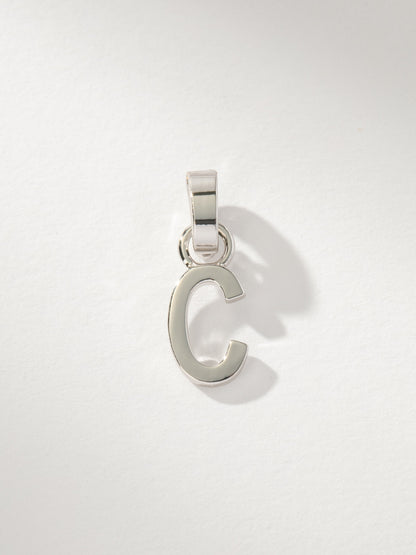 ["Letter Charm ", " Silver Solid C ", " Product Image ", " Uncommon James"]
