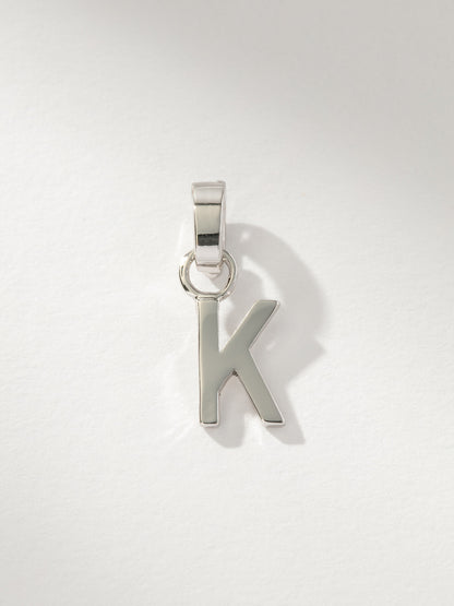 ["Letter Charm ", " Silver Solid K ", " Product Image ", " Uncommon James"]