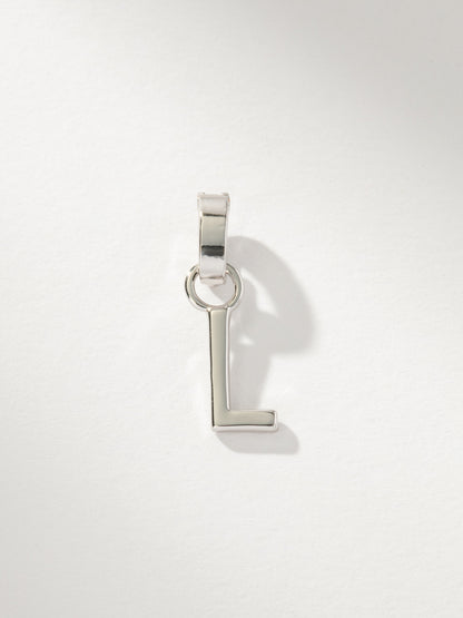 ["Letter Charm ", " Silver Solid L ", " Product Image ", " Uncommon James"]