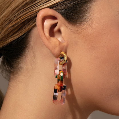 ["Resin Link Earrings ", " Pink Resin ", " Model Image 2 ", " Uncommon James"]