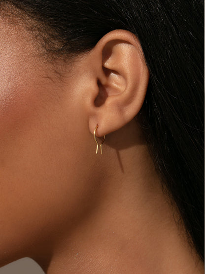["Sweet Escape Earrings ", " Gold ", " Model Image 3 ", " Uncommon James"]