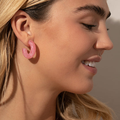 ["Tube Hoop Earrings ", " Resin Marbled Pink ", " Model Image ", " Uncommon James"]