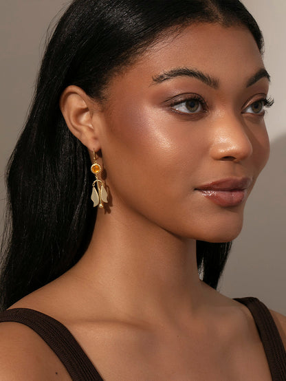 ["Wonderland Earrings ", " Gold ", " Model Image ", " Uncommon James"]