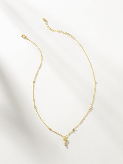 ["Angel Number Key Necklace ", " Gold ", " Product Image ", " Uncommon James"]
