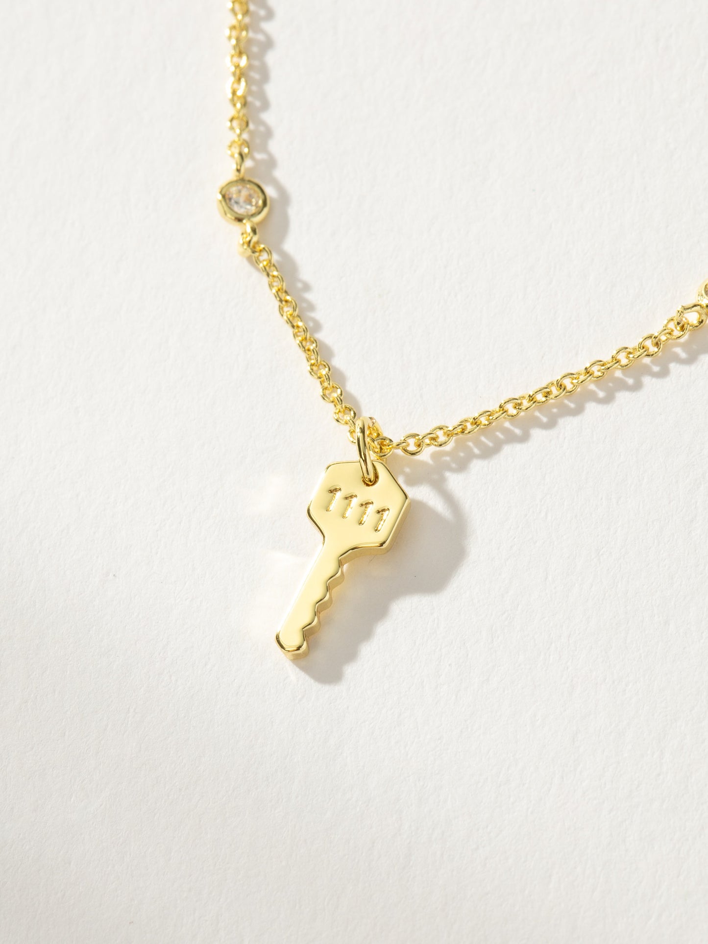 Angel Number Key Necklace | Gold | Product Detail Image | Uncommon James