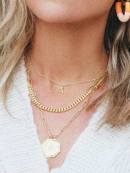 ["Angel Number Key Necklace ", " Gold ", " KC Image ", " Uncommon James"]