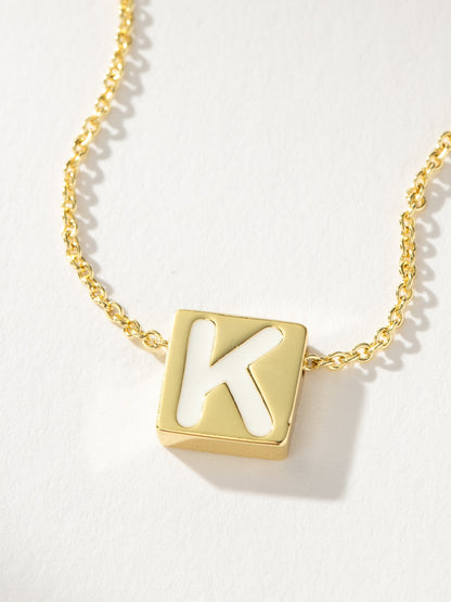 ["Bold Letter Necklace ", " Gold K ", " Product Detail Image ", " Uncommon James"]