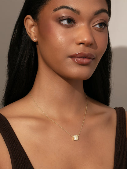["Bold Letter Necklace ", " Gold ", " Model Image ", " Uncommon James"]