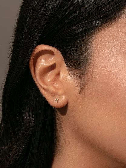["Every Angle Stud Earrings ", " Gold ", " Model Image ", " Uncommon James"]