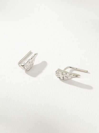 ["Angel Wings Ear Climber ", " Silver ", " Product Image ", " Uncommon James"]