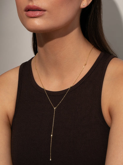 ["Icy Lariat Necklace ", " Gold ", " Model Image ", " Uncommon James"]