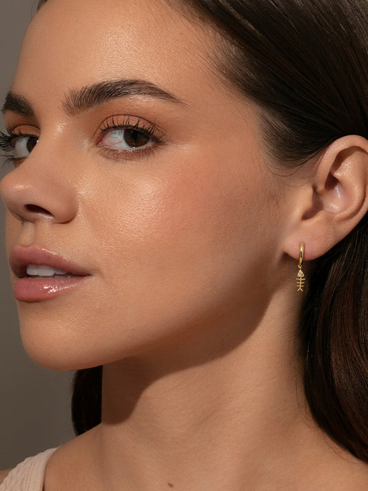 Fish Bone Huggie Earrings | Gold | Product Image | Uncommon James