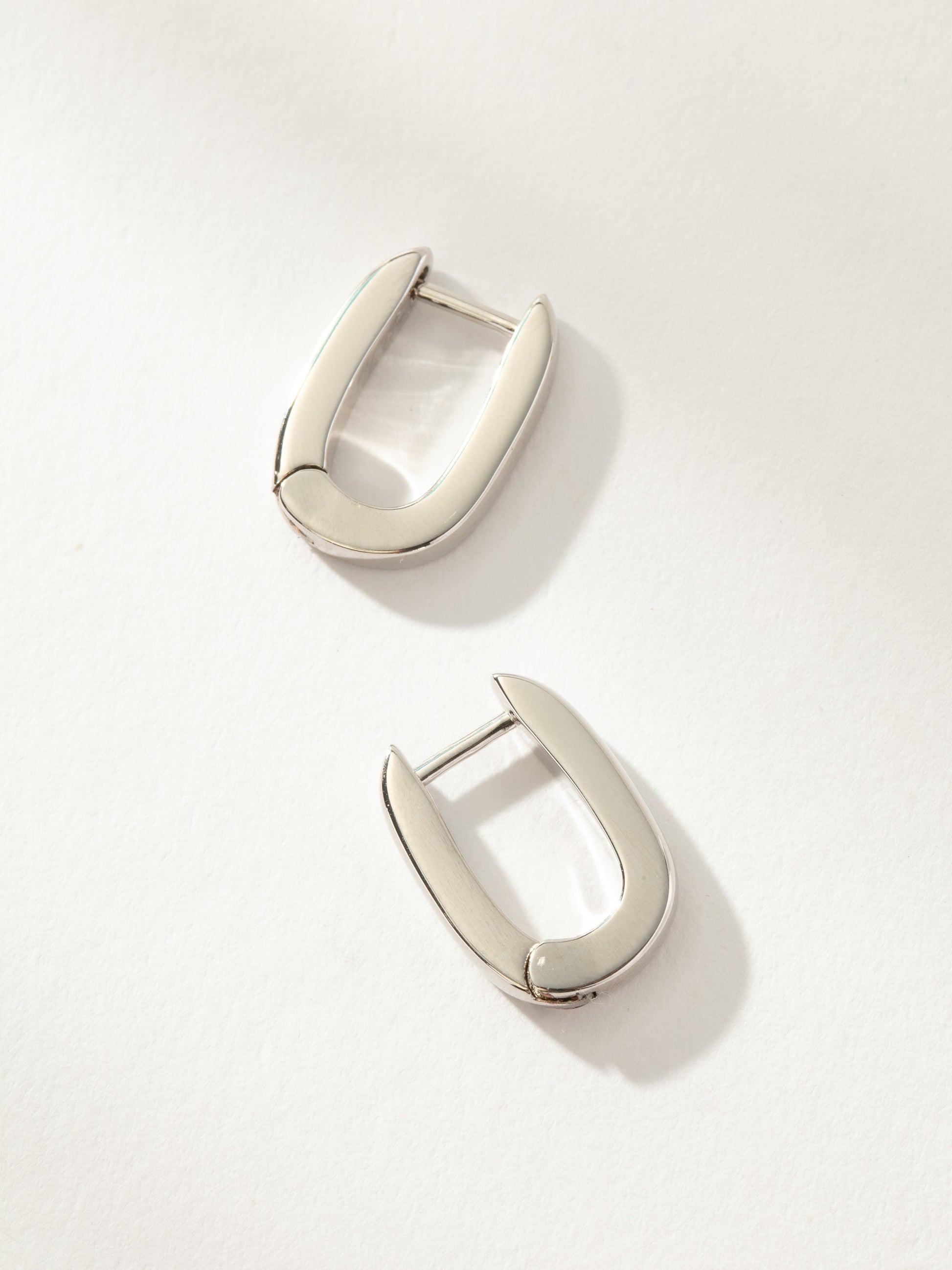 Oval Huggie Earrings | Silver | Product Image | Uncommon James