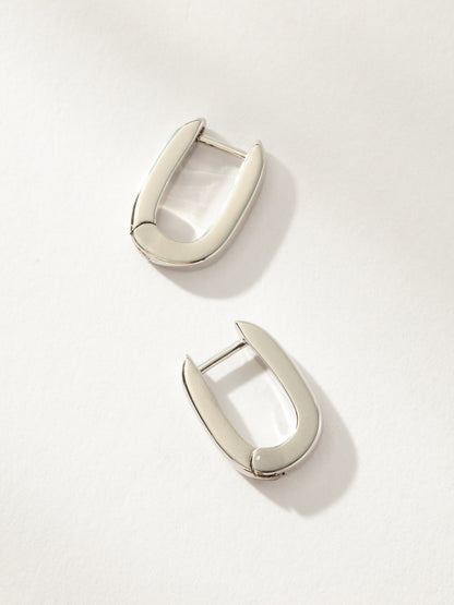 ["Oval Huggie Earrings ", " Silver ", " Product Image ", " Uncommon James"]