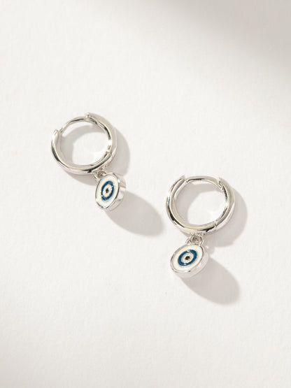 ["Simple Evil Eye Huggie Earrings ", " Silver ", " Product Image ", " Uncommon James"]
