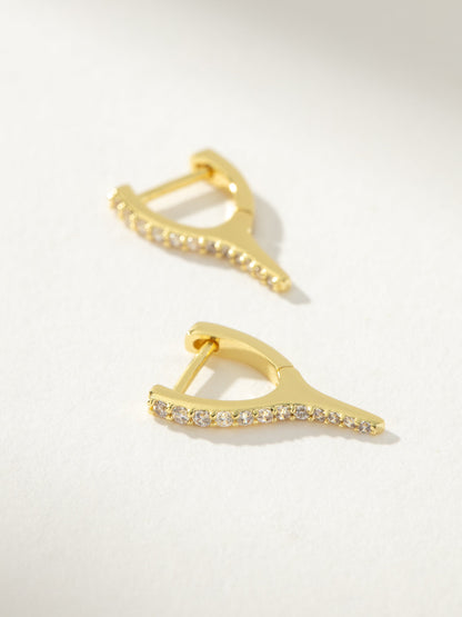 ["Wishbone Pavé Huggie Earrings ", " Gold ", " Product Detail Image ", " Uncommon James"]