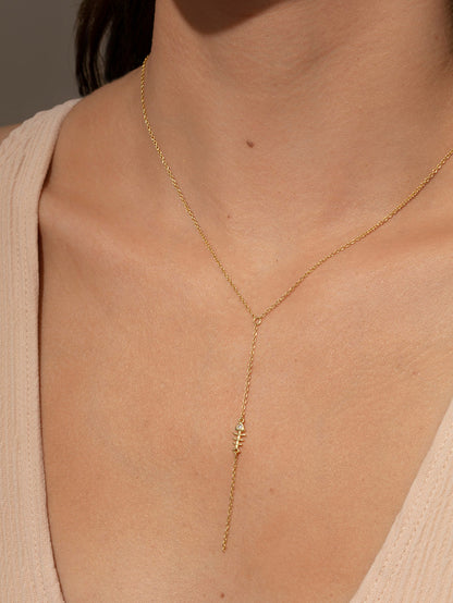 ["Fish Bone Lariat Necklace ", " Gold ", " Model Image ", " Uncommon James"]