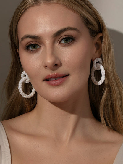 ["Interlocking Beaded Hoop Earrings ", " White ", " Model Image ", " Uncommon James"]
