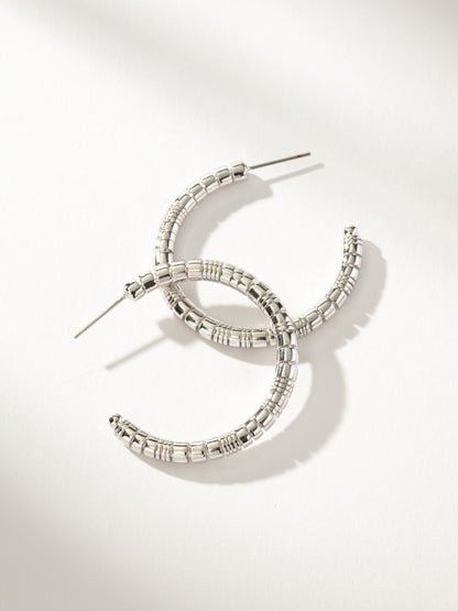 ["Next Level Hoop Earrings ", " Silver ", " Product Image ", " Uncommon James"]