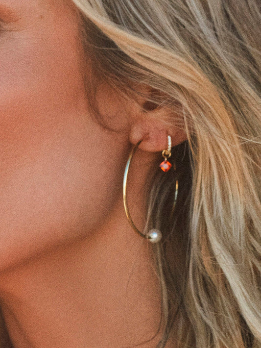 Paradise Huggie Earrings | Gold Orange | Product Image | Uncommon James