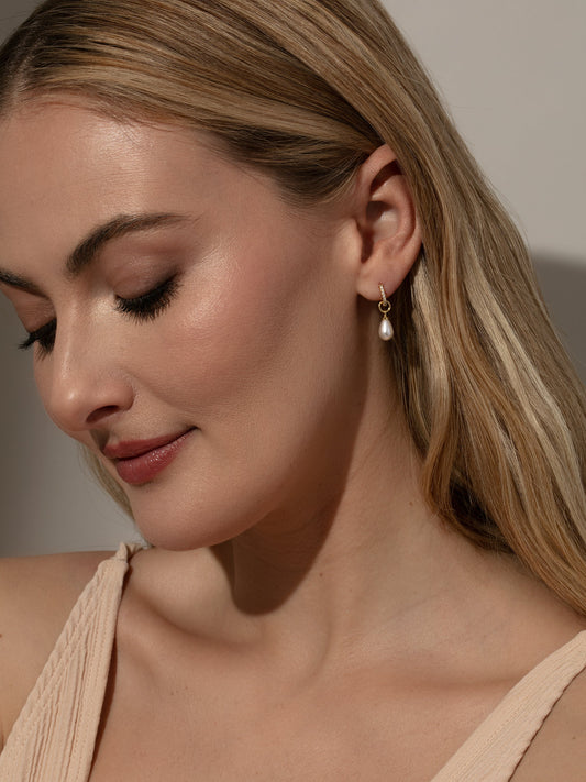 Pearl Drop Huggie Earrings | Gold | Product Image | Uncommon James