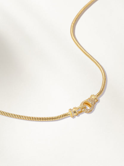 ["Locked In Snake Chain Necklace ", " Gold ", " Product Detail Image ", " Uncommon James"]