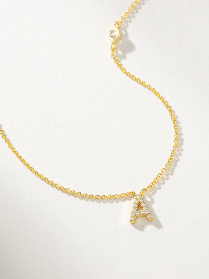 ["Pavé Initial Necklace ", " Gold A ", " Product Detail Image ", " Uncommon James"]
