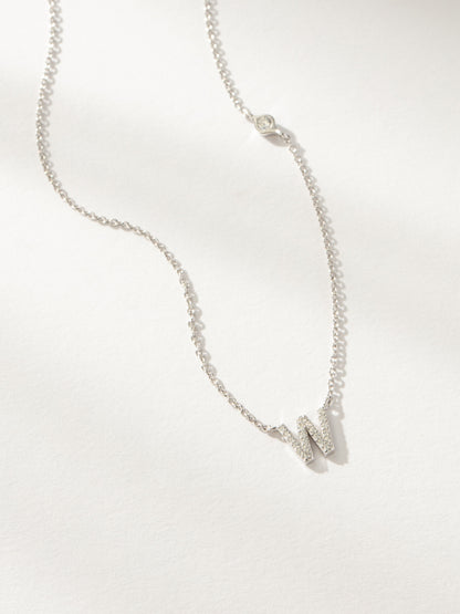 ["Pavé Initial Necklace ", " Sterling Silver W ", " Product Image ", " Uncommon James"]