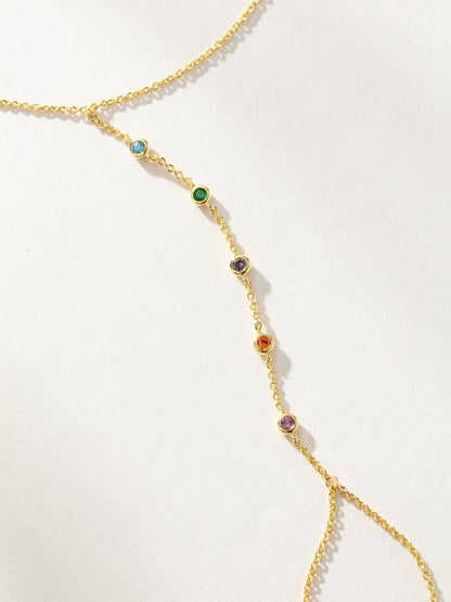 ["Rainbow Gem Hand Chain ", " Gold ", " Product Detail Image ", " Uncommon James"]