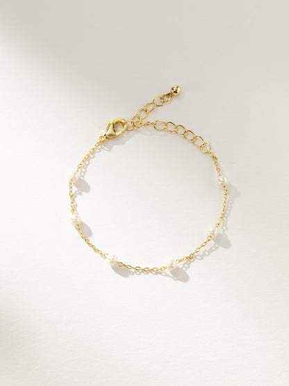 ["Pearl and Chain Bracelet ", " Gold ", " Product Image ", " Uncommon James"]