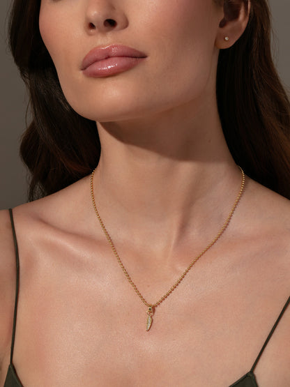 ["Feather Charm ", " Gold ", " Model Image ", " Uncommon James"]