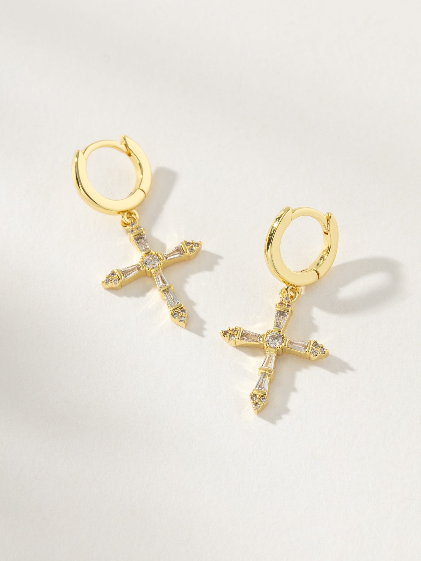Crystalized Cross Huggie Earrings | Gold | Product Image | Uncommon James