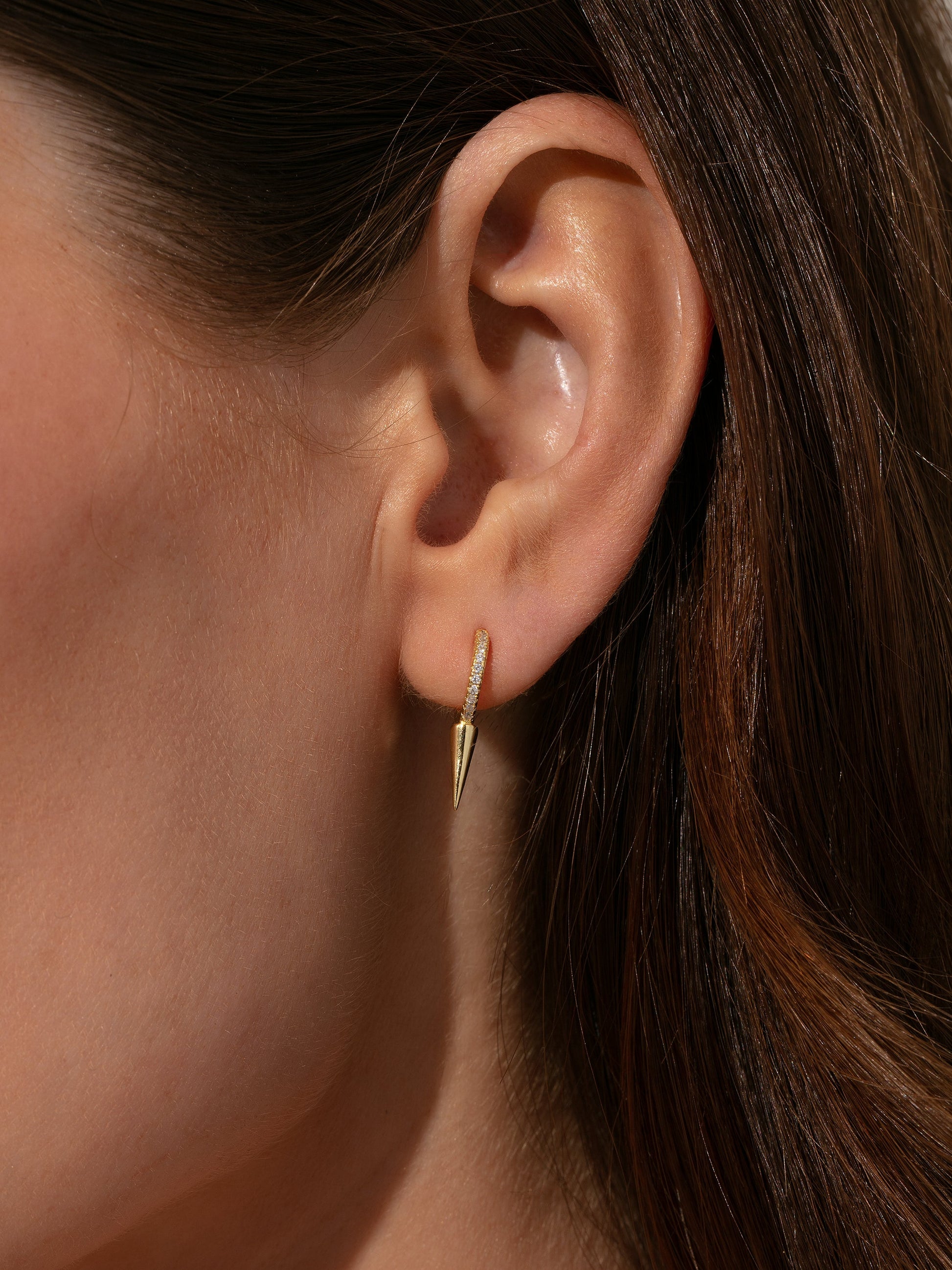 Killer Spike Huggie Earrings | Gold | Model Image | Uncommon James
