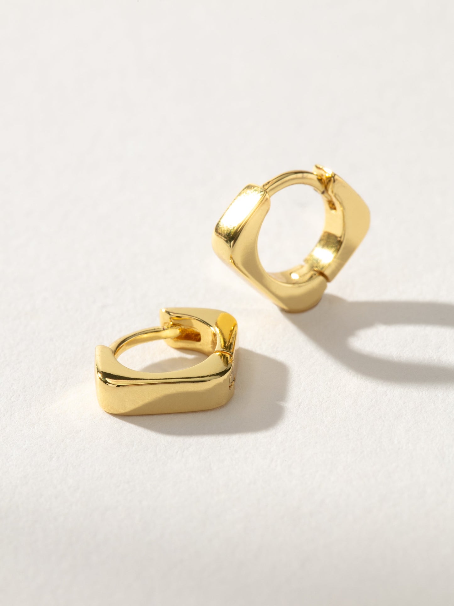 Money Maker Huggie Earrings | Gold | Product Image | Uncommon James