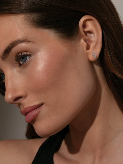 ["Unexpected Bar Stud Earrings ", " Sterling Silver ", " Model Image ", " Uncommon James"]