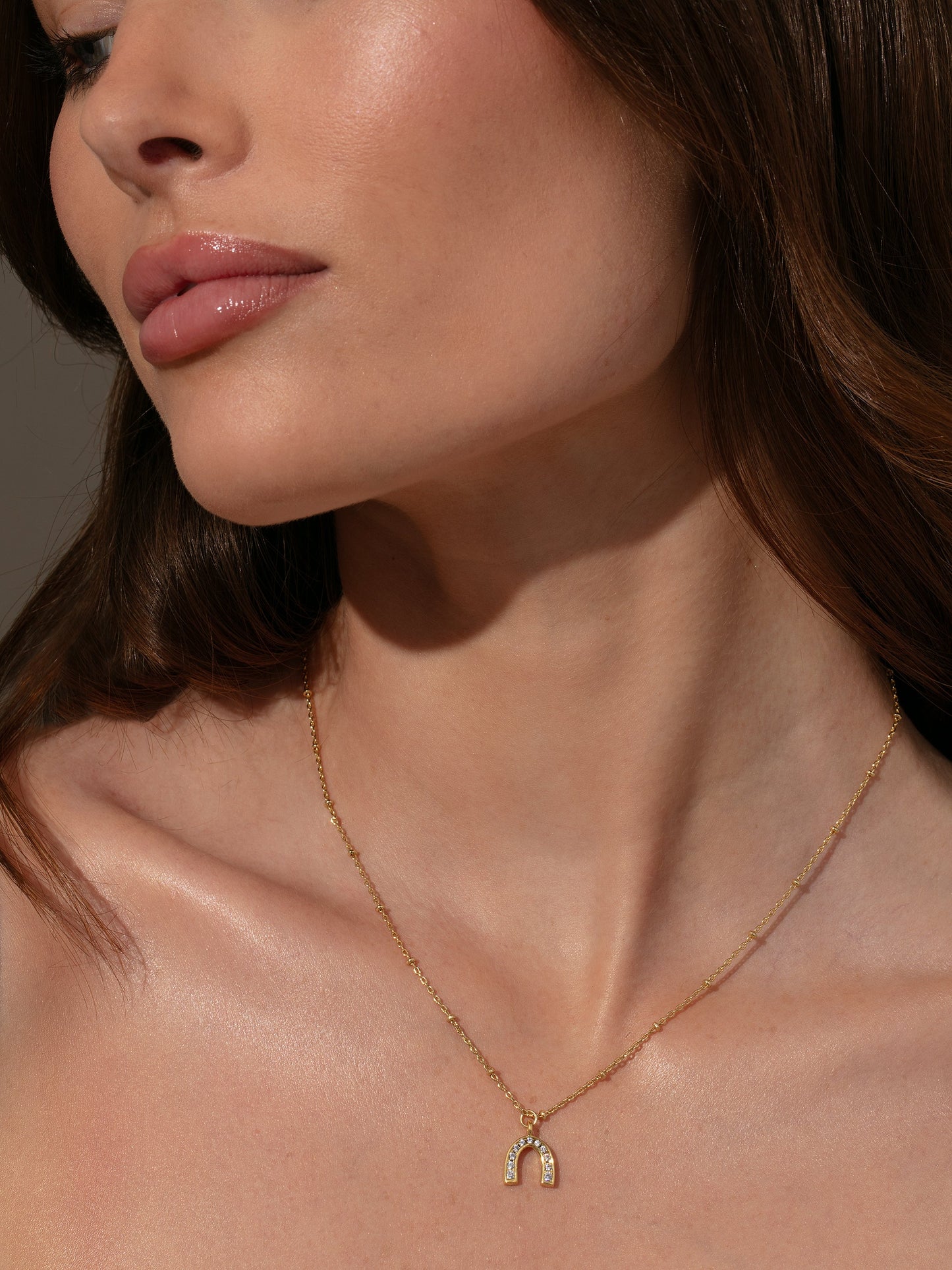 Horseshoe Pendant Necklace | Gold | Model Image | Uncommon James