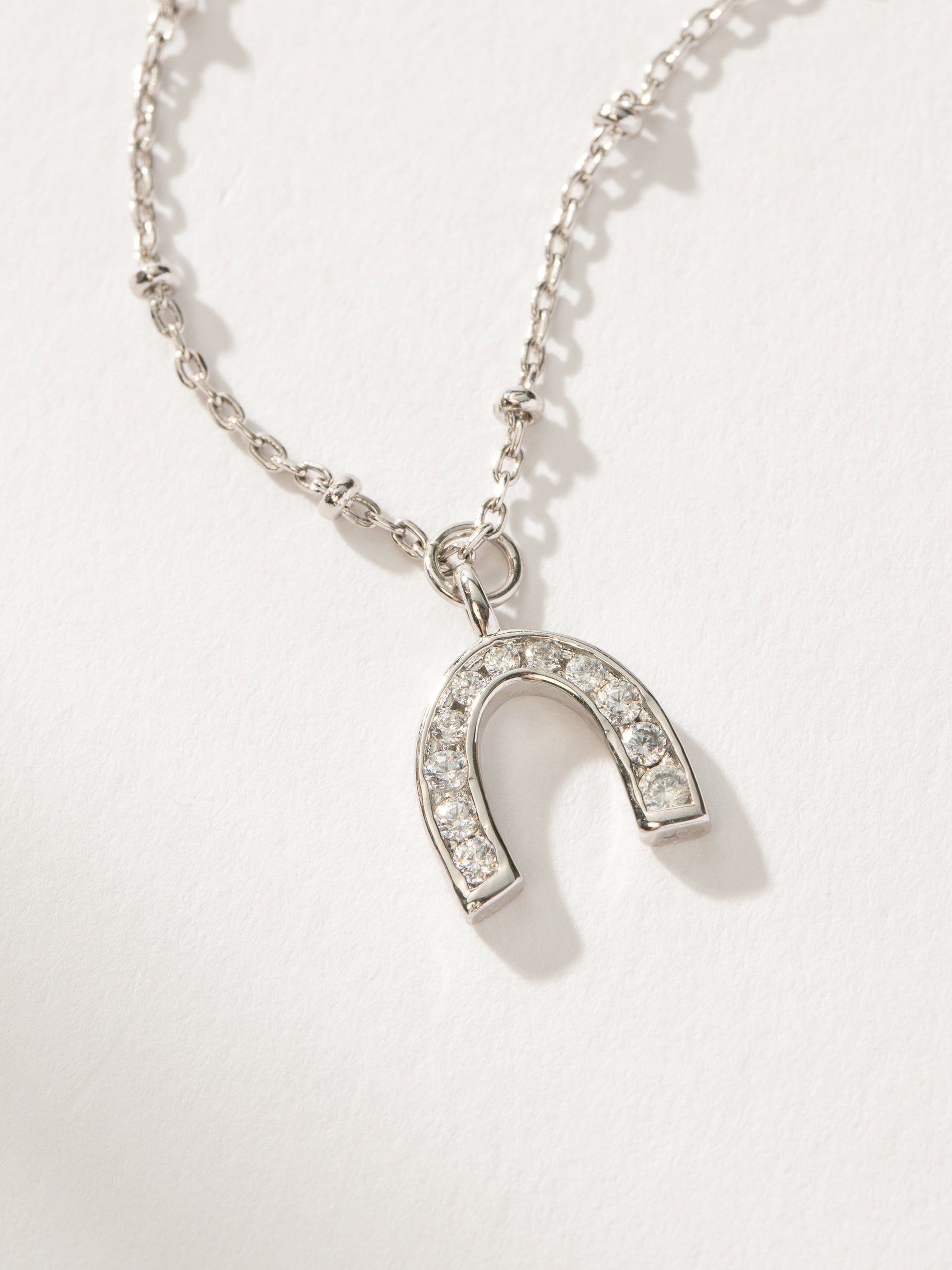 Horseshoe Pendant Necklace | Silver | Product Detail Image | Uncommon James
