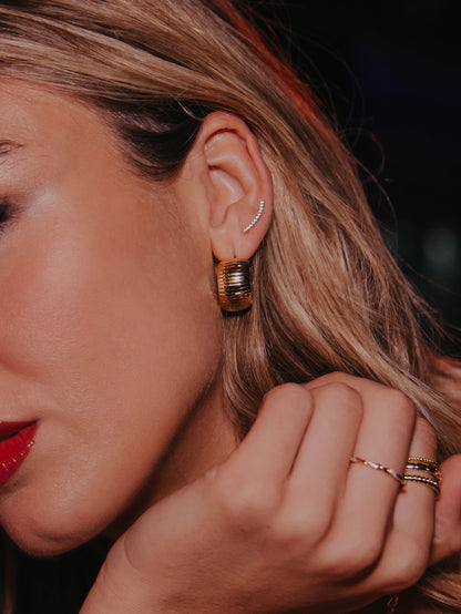 ["Pavé Bar Ear Climber ", " Gold ", " Campaign Image ", " Uncommon James"]