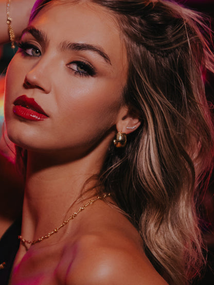 ["Ribbed Statement Hoop Earrings ", " Gold ", " Campaign Image ", " Uncommon James "]