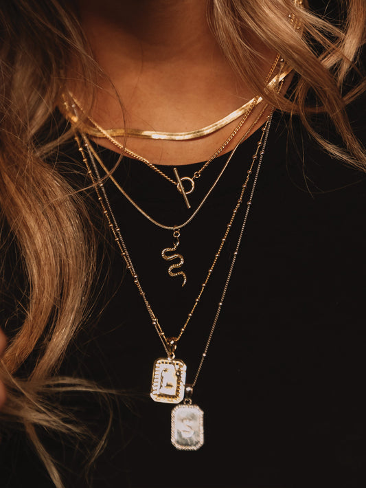 Snake Pendant Necklace | GOLD | Model Image | Uncommon James