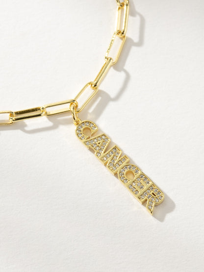 ["Zodiac Nameplate Pendant Necklace ", "  Gold Cancer ", " Product Image ", " Uncommon James"]