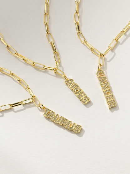 ["Zodiac Nameplate Pendant Necklace ", " Gold ", " Group Shot ", " Product Image ", " Uncommon James"]