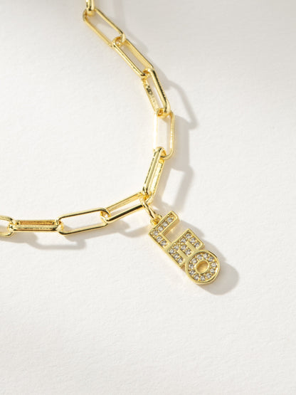 ["Zodiac Nameplate Pendant Necklace ", " Gold Leo ", " Product Image ", " Uncommon James"]