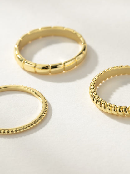 ["Vortex Textured Ring Stack (Set of 3) ", " Gold ", " Product Image ", " Uncommon James"]