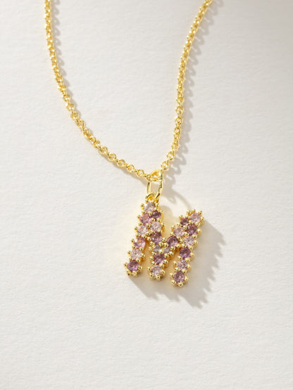 ["Pretty In Pink Initial Necklace ", " Gold M ", " Product Detail Image ", " Uncommon James"]
