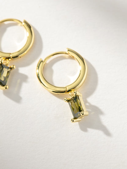 ["Birthstone Huggie Earrings ", " Gold August ", " Product Detail Image ", " Uncommon James"]